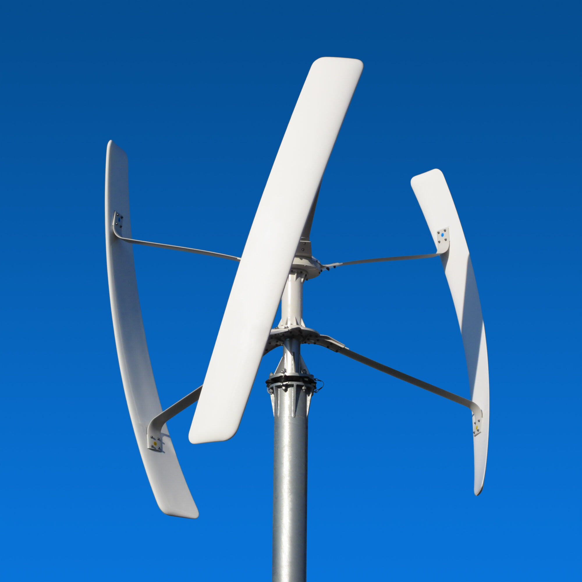 Financial Support Options for Small Wind Turbines in the United Kingdom. A vertical axis wind turbine against a blue sky.